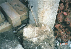 house stumps with rusted steel rods